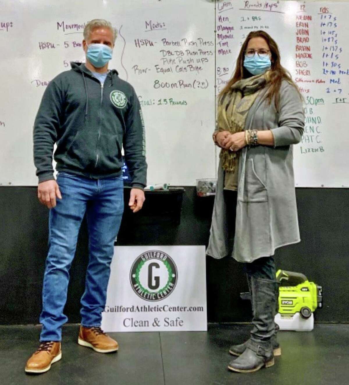 Clint Zeidenberg and Hannah Jurewicz, a Guilford psychologist, at the Guilford Athletic Center, who created the unique program, which comprises a one-hour workout followed by a recovery meeting.