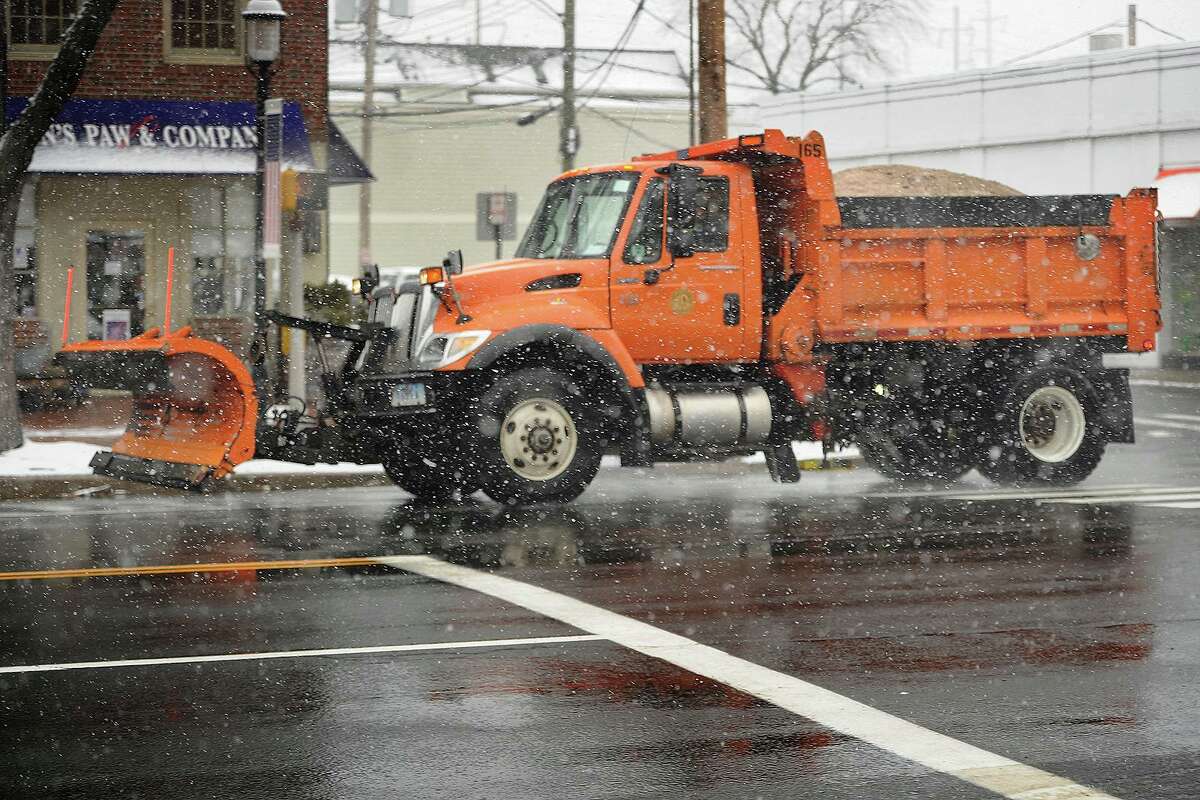 A Fairfield Public Works plow truck during the snow on the Post Road in Fairfield, Conn. on Wednesday, March 21, 2018.