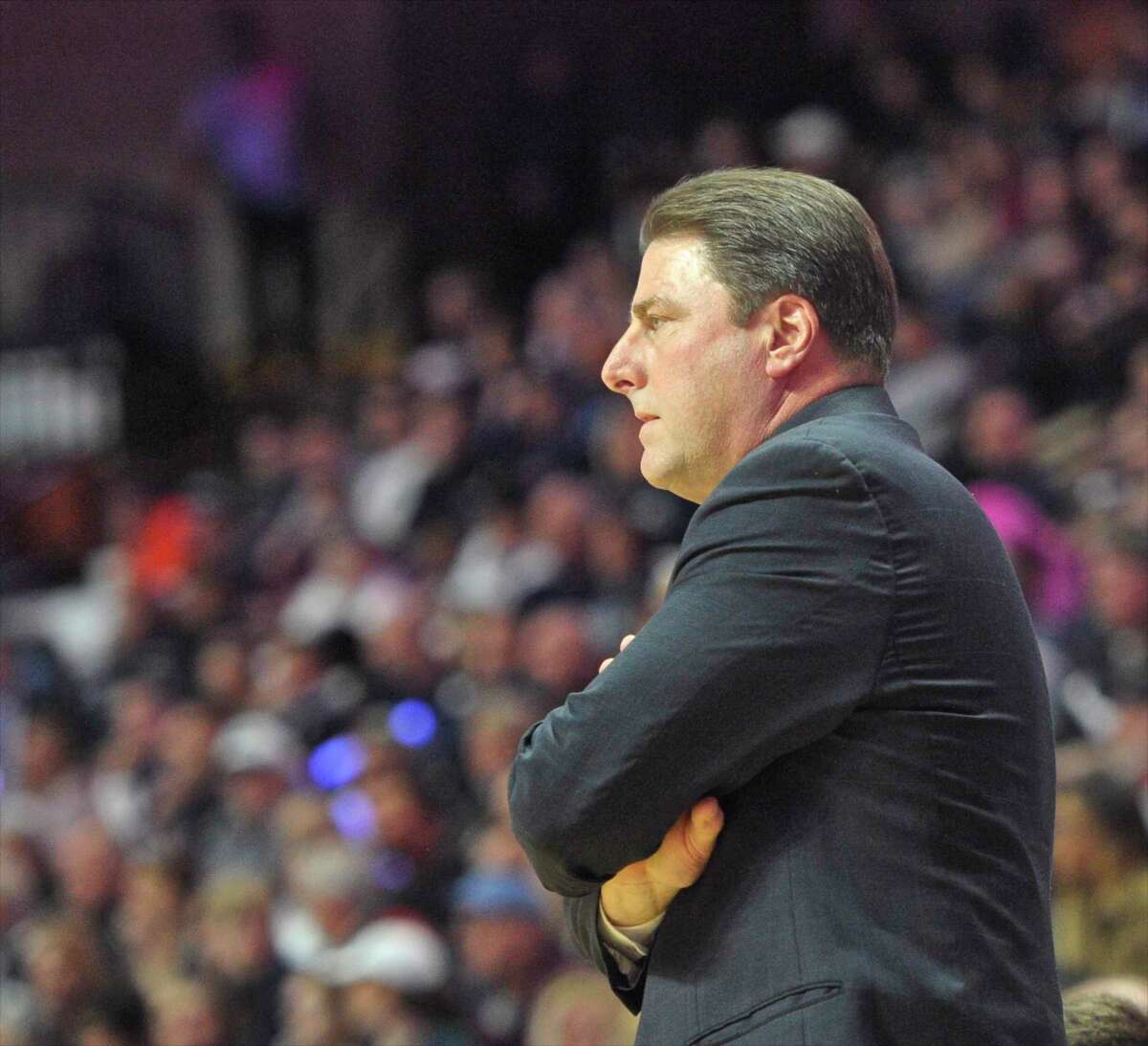 Coginchaug head coach Todd Salva watches his team during the Class S boys basketball championship game aganist Immaculate in 2016 at Mohegan Sun Arena.