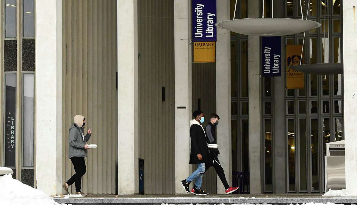 Students are seen walking on campus as classes resume at University at Albany Monday, Feb. 1, 2021 in Albany, N.Y. (Lori Van Buren/Times Union)
