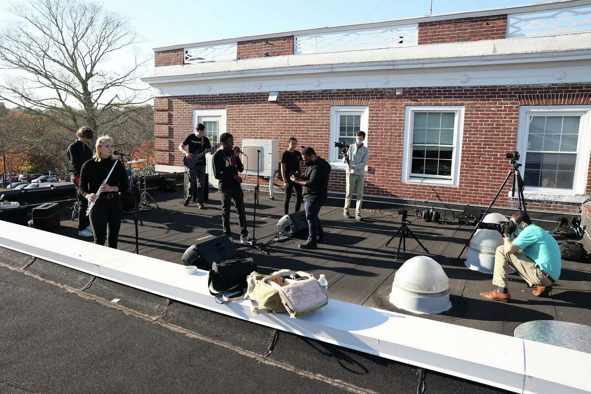 A music video titled: “Times Like These,” and featuring the St. Luke’s School’s in New Canaan Blues Band members, and was recently filmed on the school’s rooftop, premiered at the school’s 19th State of the School address on Thursday, November 19, 2020, and seems destined to go down in history as one of the coolest things a school has ever done. (From left) is: the St. Luke’s School’s Blues Band, A/V Specialist Bryan DeVissiere, a Senior student at the school, Brian Douglas, Class of 2021, and the school’s Academic Technologist, Eli Fendelman.