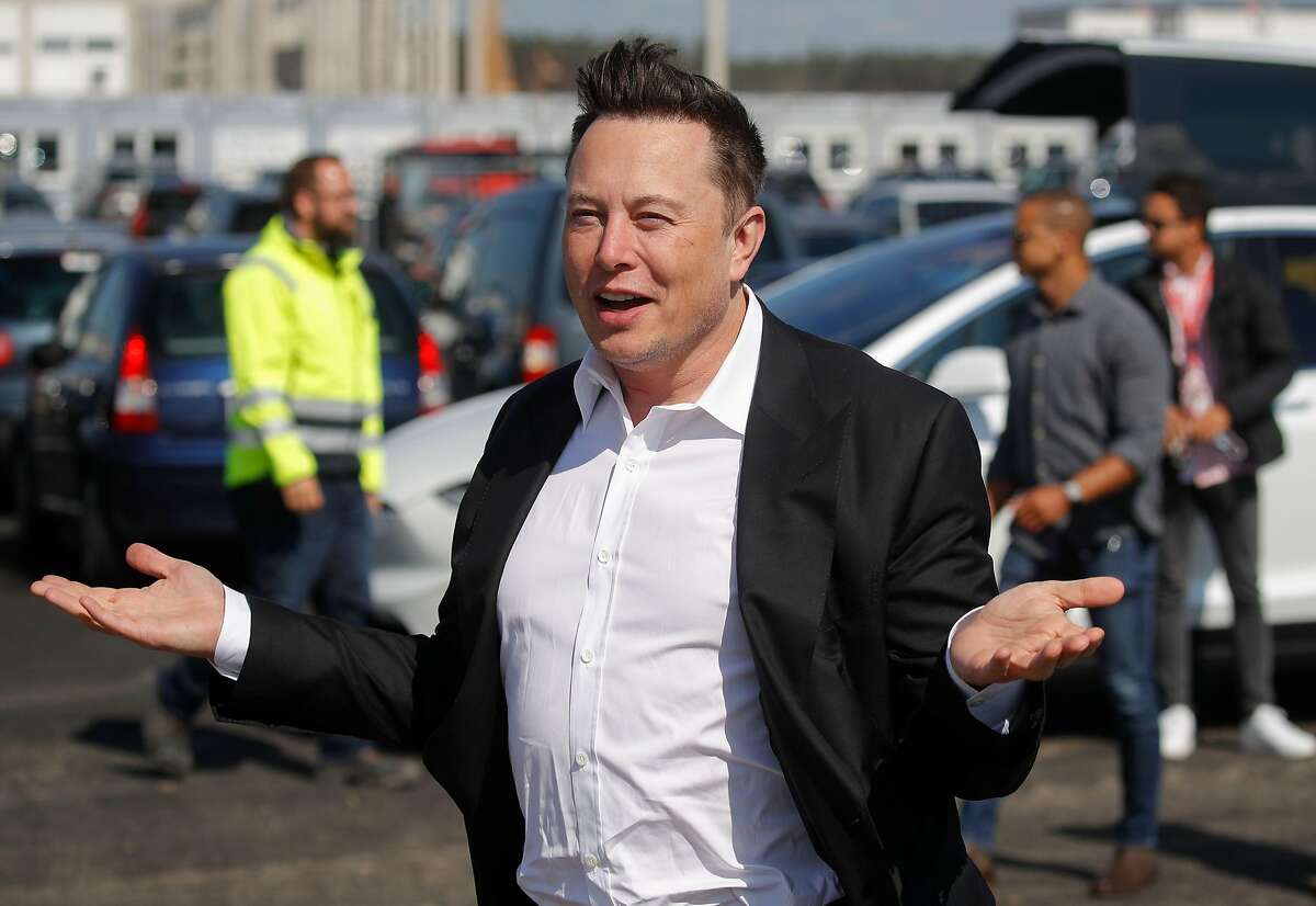 Tesla CEO Elon Musk gestures as he arrives to visit the construction site of U.S. electric car giant Tesla, on Sept. 3, 2020, in Grünheide near Berlin.
