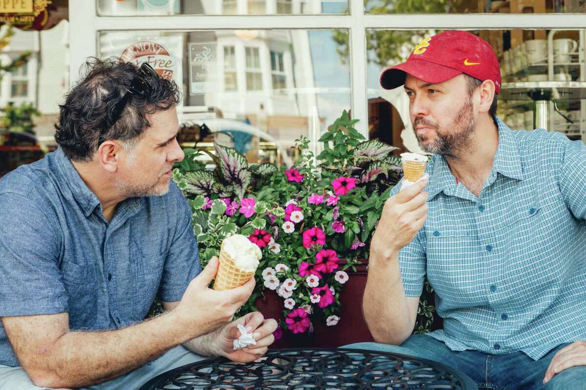 Thrown Stone Theater Company co-artistic directors from left to right Jason Peck and Jonathon Winn eating ice cream at Ridgefield's, CT, famous Deborah Ann's Sweet Shoppe.
