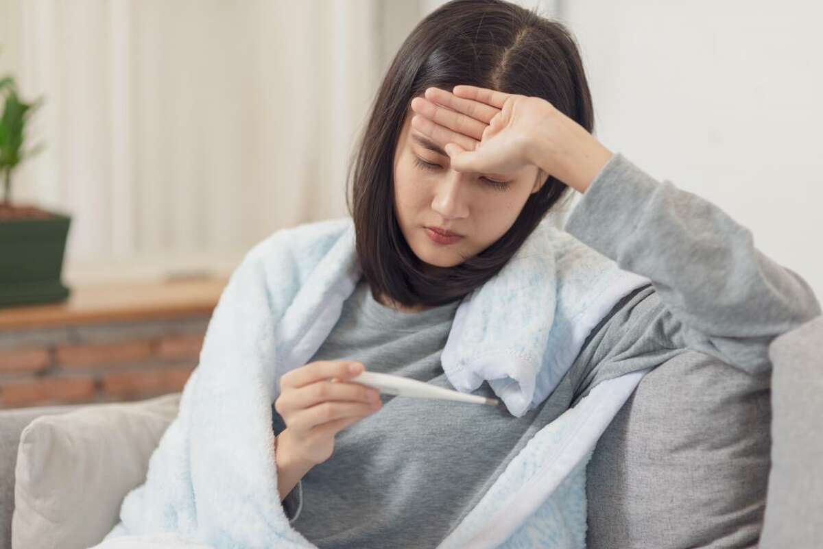 What are the major COVID-19 symptoms? The symptoms of the flu and COVID-19 are a bit similar, so it’s important to pay attention right now if you get sick. Both can include fever, muscle ache, and fatigue, but COVID-19 symptoms often also include a dry cough and shortness of breath. If you have any questions about your symptoms, call the Centers for Disease Control Self-Check and call your doctor. If you are experiencing respiratory distress, seek medical help immediately.