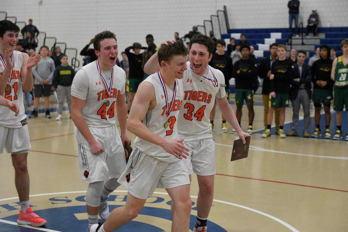 Ridgefield defeated Trinity Catholic 63-58 in the FCIAC boys basketball final at the Wilton Fieldhouse on March 5, 2020 in Wilton, Connecticut.