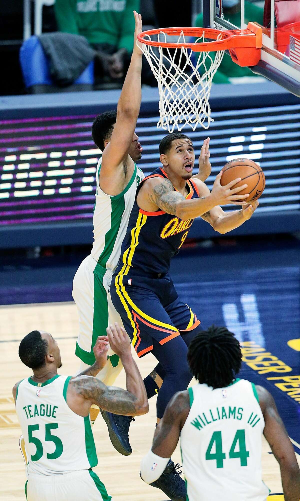 Juan Toscano Anderson (95) shoots in the first half as the Golden State Warriors played the Boston Celtics at Chase Center in San Francisco, Calif., on Tuesday, February 2, 2021.