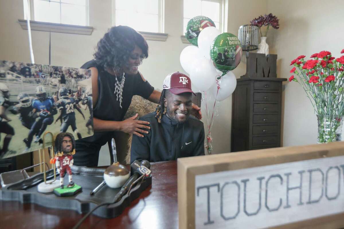 LJ Johnson, Cy-Fair running back announced his commitment to Texas A&M on National Signing Day to the delight of his mother, Alessia Johnson Wednesday, Feb. 3, 2021, in Cypress.