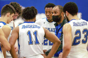 LCCC assistant coach Kavon Lacey gives instructions to the Trailblazers during a timeout. The Trailblazers dropped an 86-67 decision at Wabash Valley Wednesday night in Mount Carmel. Lacey and the Trailblazers are shown in Monday’s season opener with Southwestern Illinois.