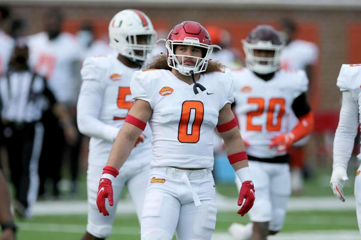 American Team linebacker Grant Stuard of Houston (0) during the first half of the NCAA college football Senior Bowl in Mobile, Ala, Saturday, Jan. 30, 2021. (AP Photo/Rusty Costanza)