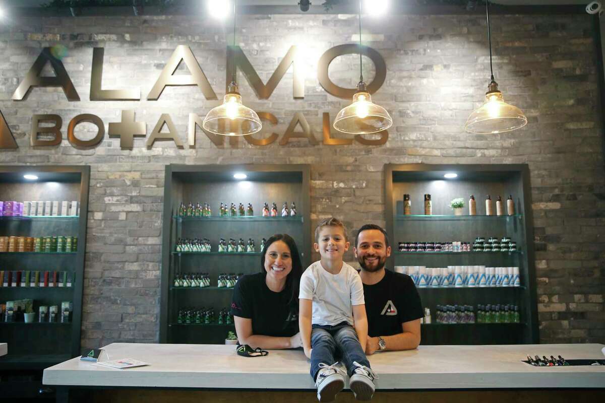 David and Nancy Burrow, both 34, pose with their son, Carter, 6, at the Alamo Botanicals location off Huebner Road, Tuesday, Feb. 2, 2021. The business started in 2017 with the Stone Oak location and has since opened three other locations, including one in New Braunfels.