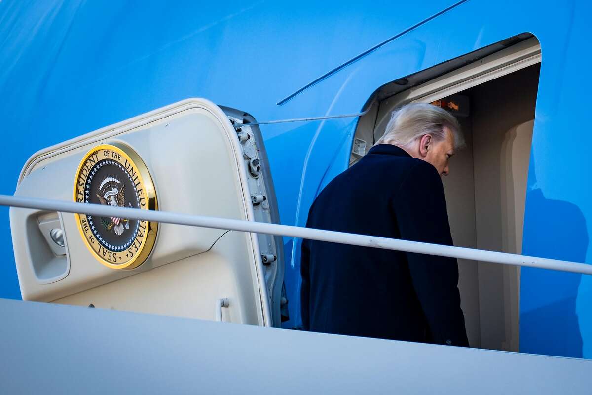 Former President Donald Trump boards Air Force One for the last time.