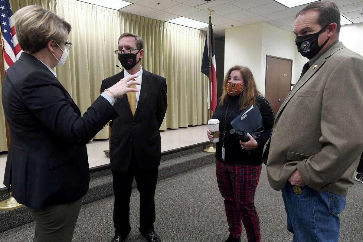 From left, Angie Hebert with the Medical Center of Southeast Texas, Jefferson County Judge Jeff Branick, Allison Getz and Michael White with Emergency Management talk following a joint press conference Monday to discuss the team effort being used to prepare for and obtain COVID-19 vaccine. Photo taken Monday, January 25, 2021 Kim Brent/The Enterprise