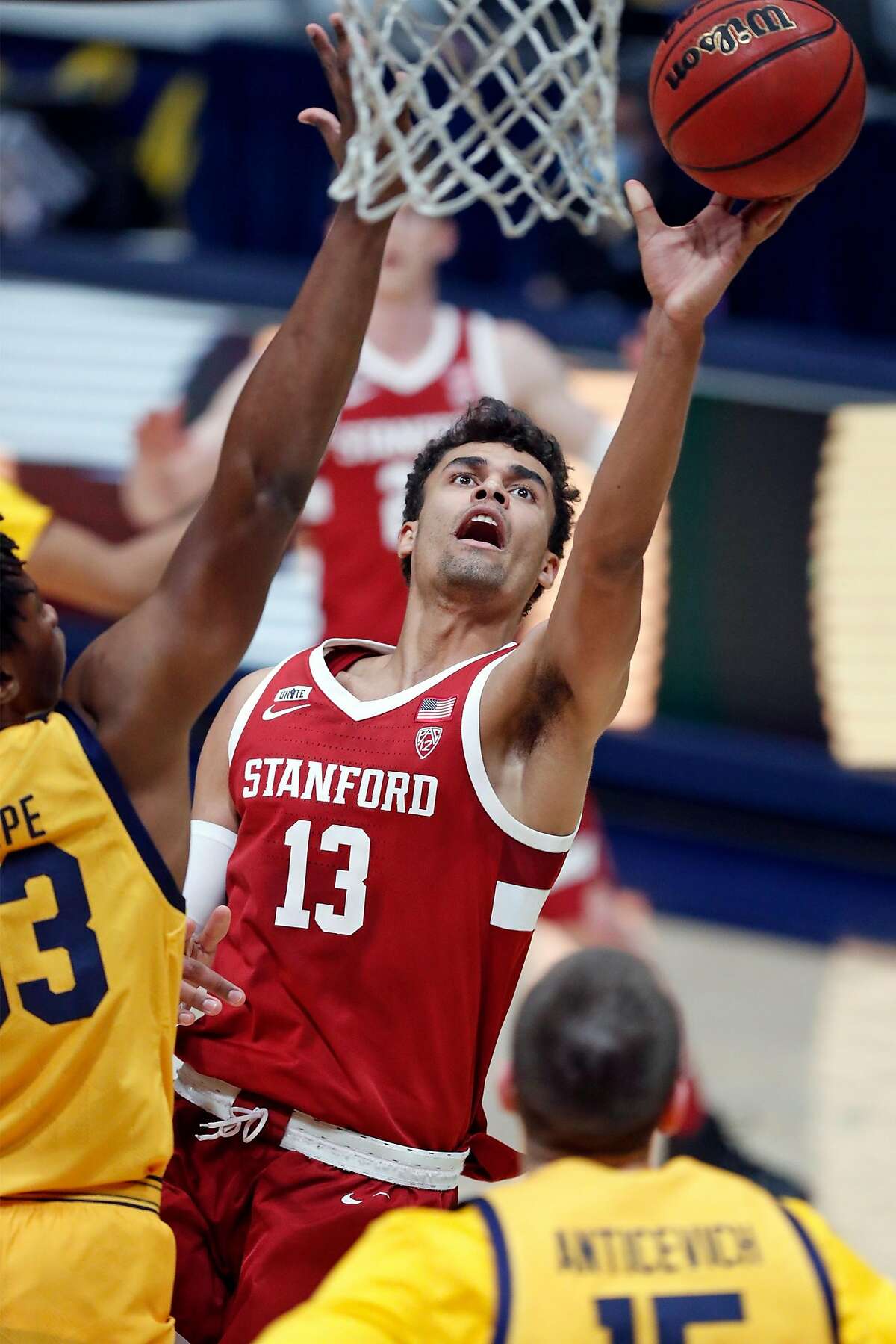 Stanford's Oscar da Silva looks to score against Cal’s D.J. Thorpe in the first half Thursday night at Haas Pavilion in Berkeley. The Pac-12’s leading scorer registered 24 points to help his team return to its winning ways after two losses in a row.
