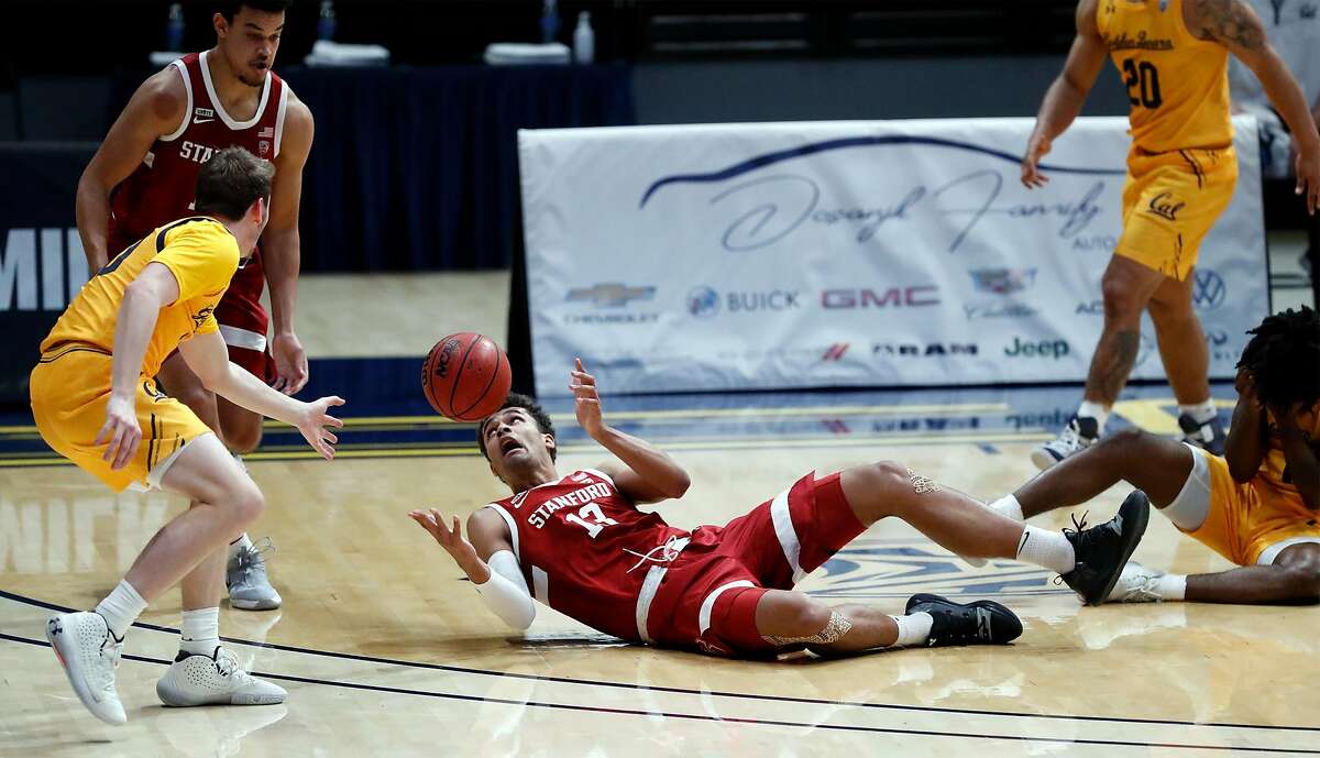 Stanford's Oscar da Silva corrals a loose ball against California in 1st half during Pac 12 men's basketball game at Haas Pavilion in Berkeley, Calif., on Thursday, February 4, 2021.