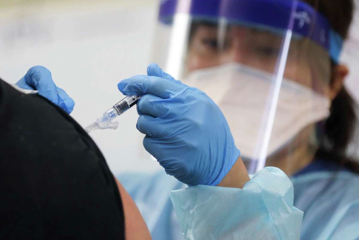Though eight more people have tested positive for flu in Connecticut, the illness remains almost a non-entity this season. (Mario Tama/Getty Images/TNS)