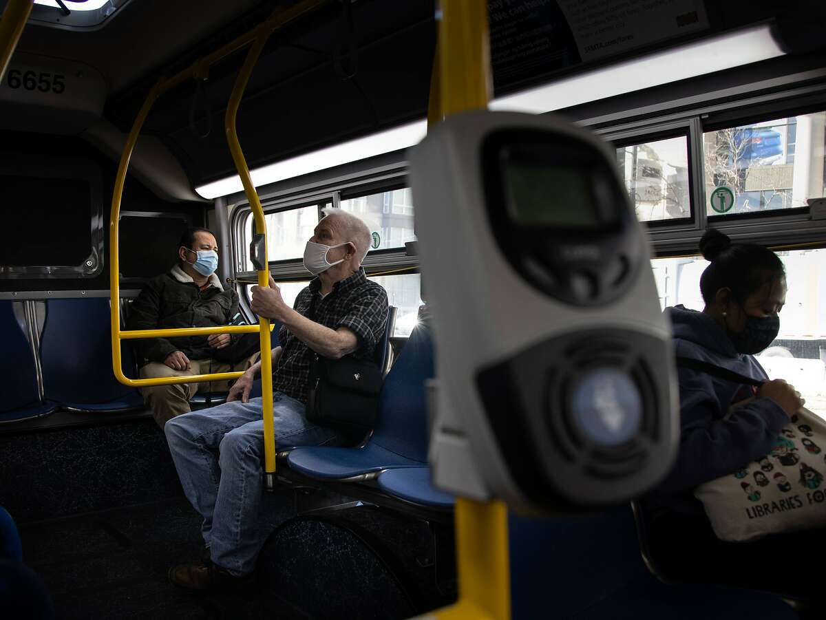 Denny Smith is riding a city bus on Friday, Feb. 5, 2021 in San Francisco, Calif.