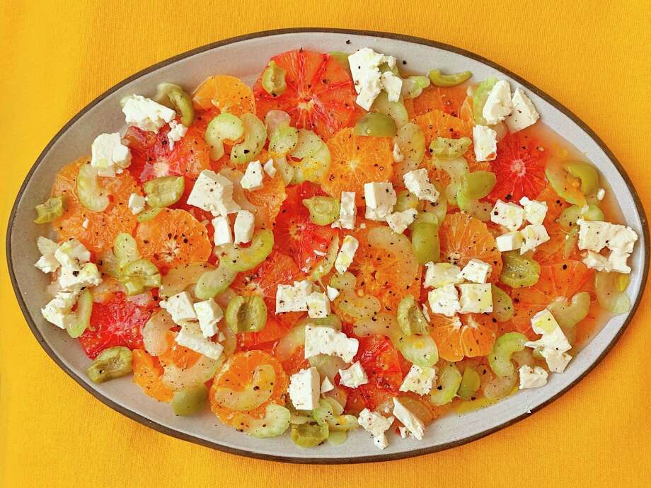 Feta, celery and green olives add just the right amount of saltiness to a salad of sweet orange citrus. (Ben Mims/TNS)