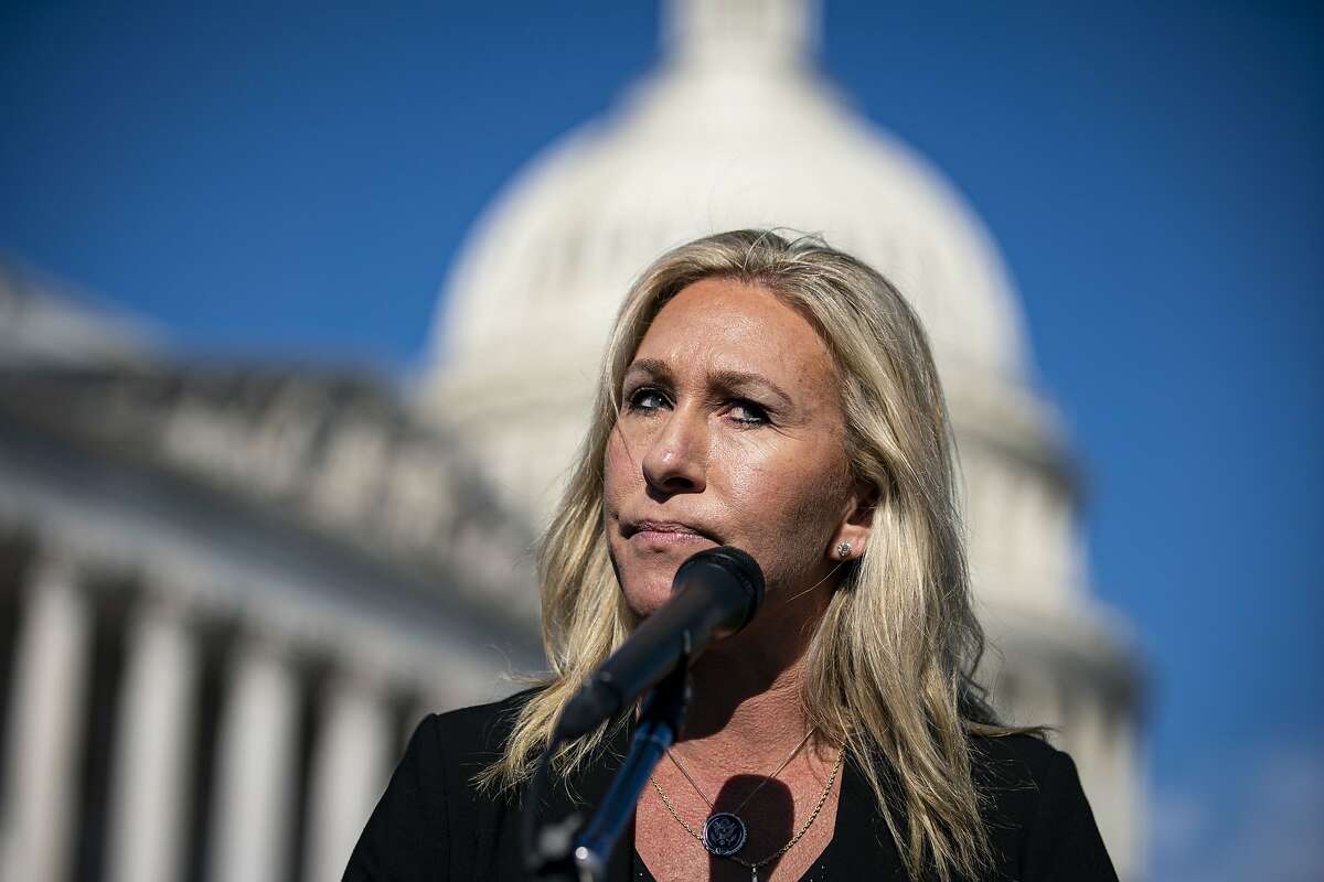 Representative Marjorie Taylor Greene, a Republican from Georgia, pauses while speaking during a news conference outside the U.S. Capitol in Washington, D.C., U.S., on Friday, Feb. 5, 2021.