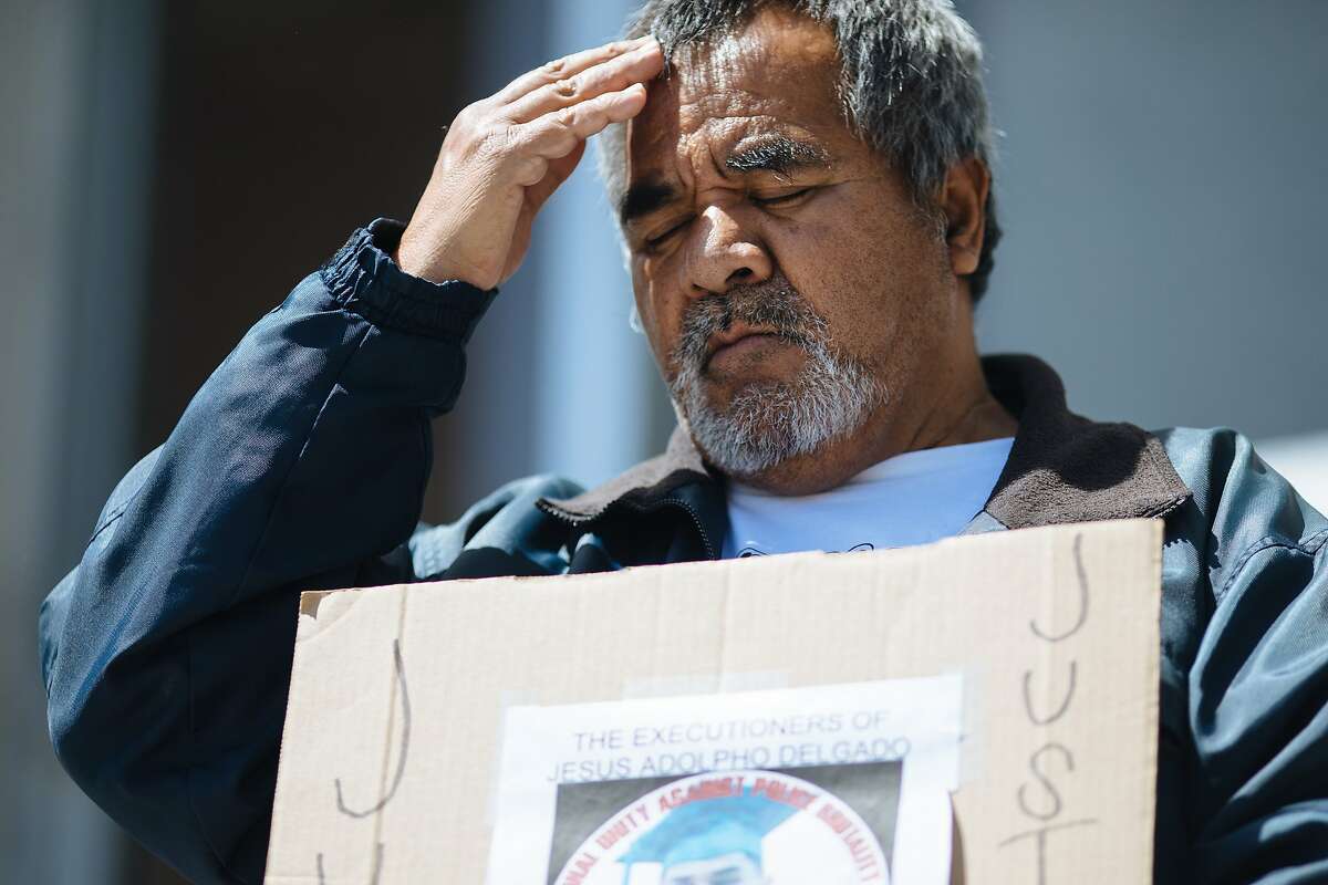 Jose Delgado, whose son Jesus Adolfo Delgado-Duarte was killed in a shootout with police, takes part in a protest in April 2018 against police shootings.