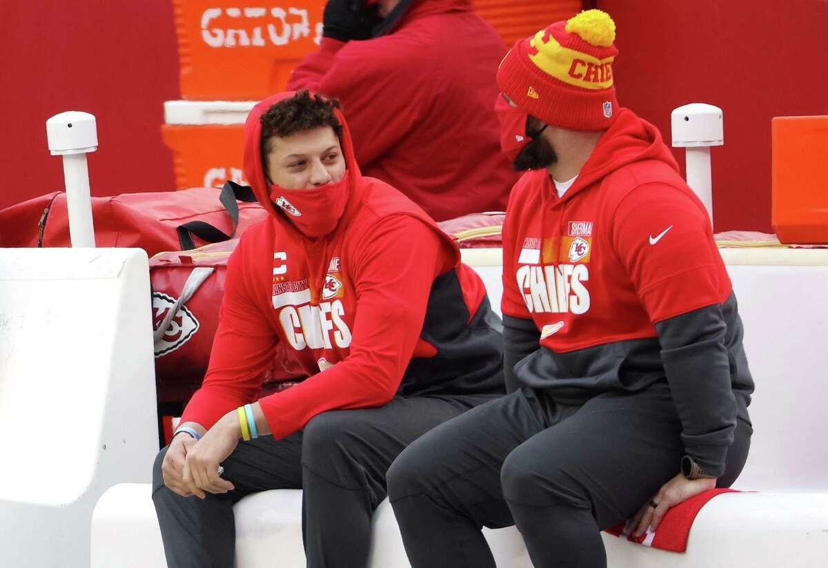 The Chiefs’ Patrick Mahomes, left, sits on the bench with Anthony Sherman before the AFC Championship game against the Buffalo Bills at Arrowhead Stadium in January in Kansas City.