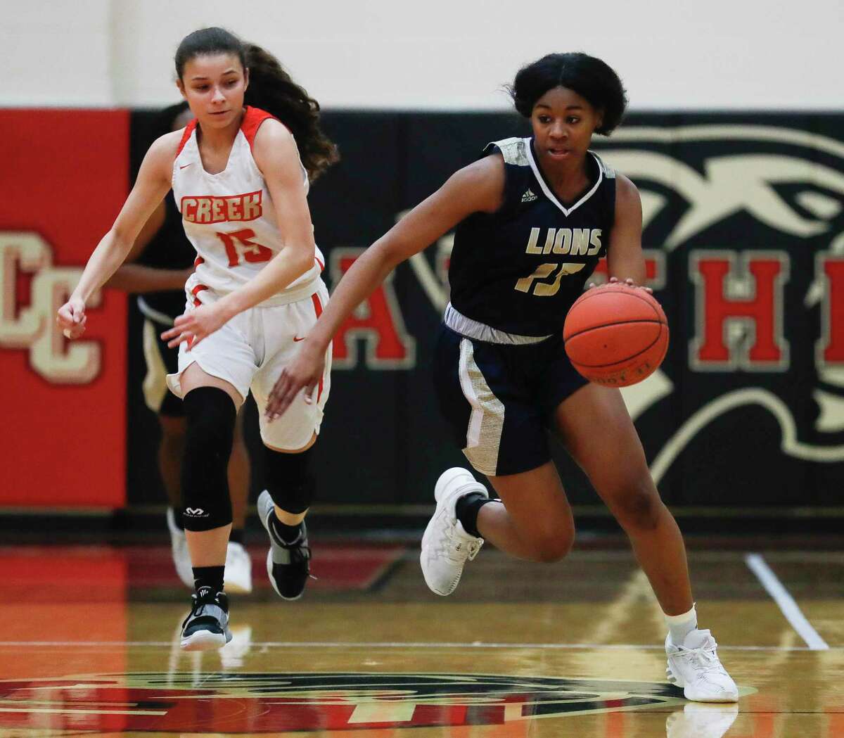 GIRLS HOOPS: Lake Creek tops Caney Creek, both teams turn focus to playoffs