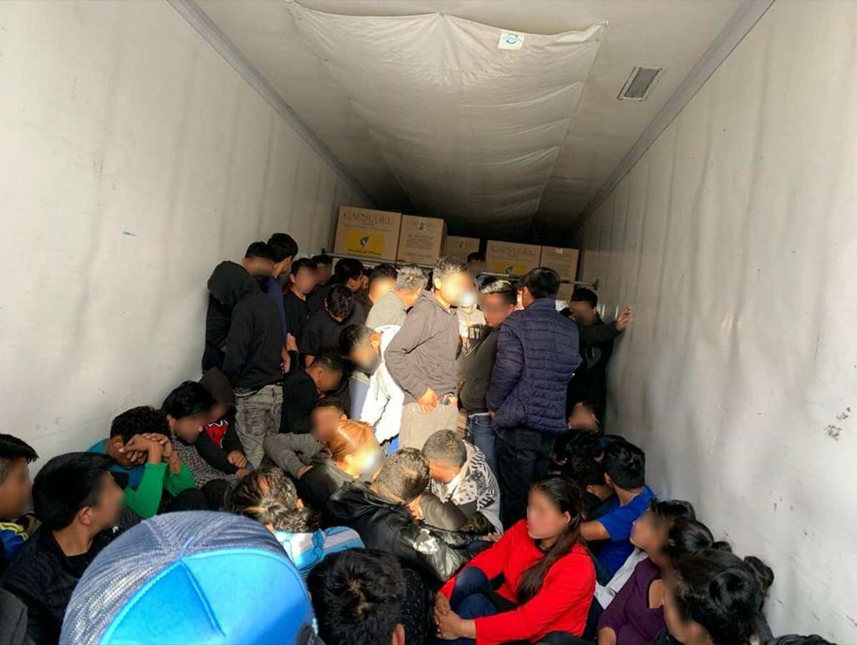 U.S. Border Patrol agents said they discovered 77 immigrants inside a trailer that was parked near the intersection of Ruhlman and Quivira drives in the Pan American Business Park in northwest Laredo.