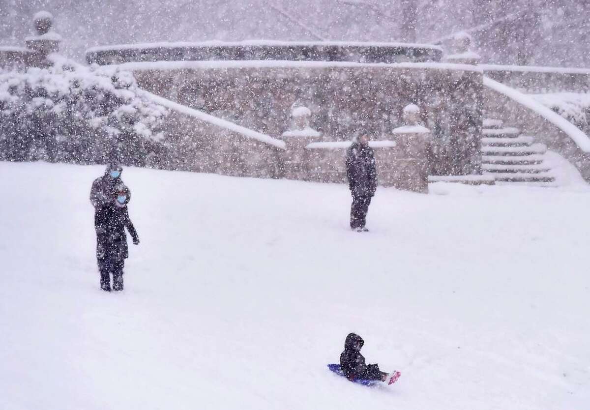 New Haven, Connecticut - Sunday, February 07, 2021: Sledding at Edgerton Park in New Haven during a whiteout of falling snow.