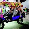 Participants in the Mid-County Cruisers' Mardi Gras parade and toss beads and other swag as they make their way through Port Neches and Nederland Saturday night. Photo created Saturday, February 6, 2021 Kim Brent/The Enterprise