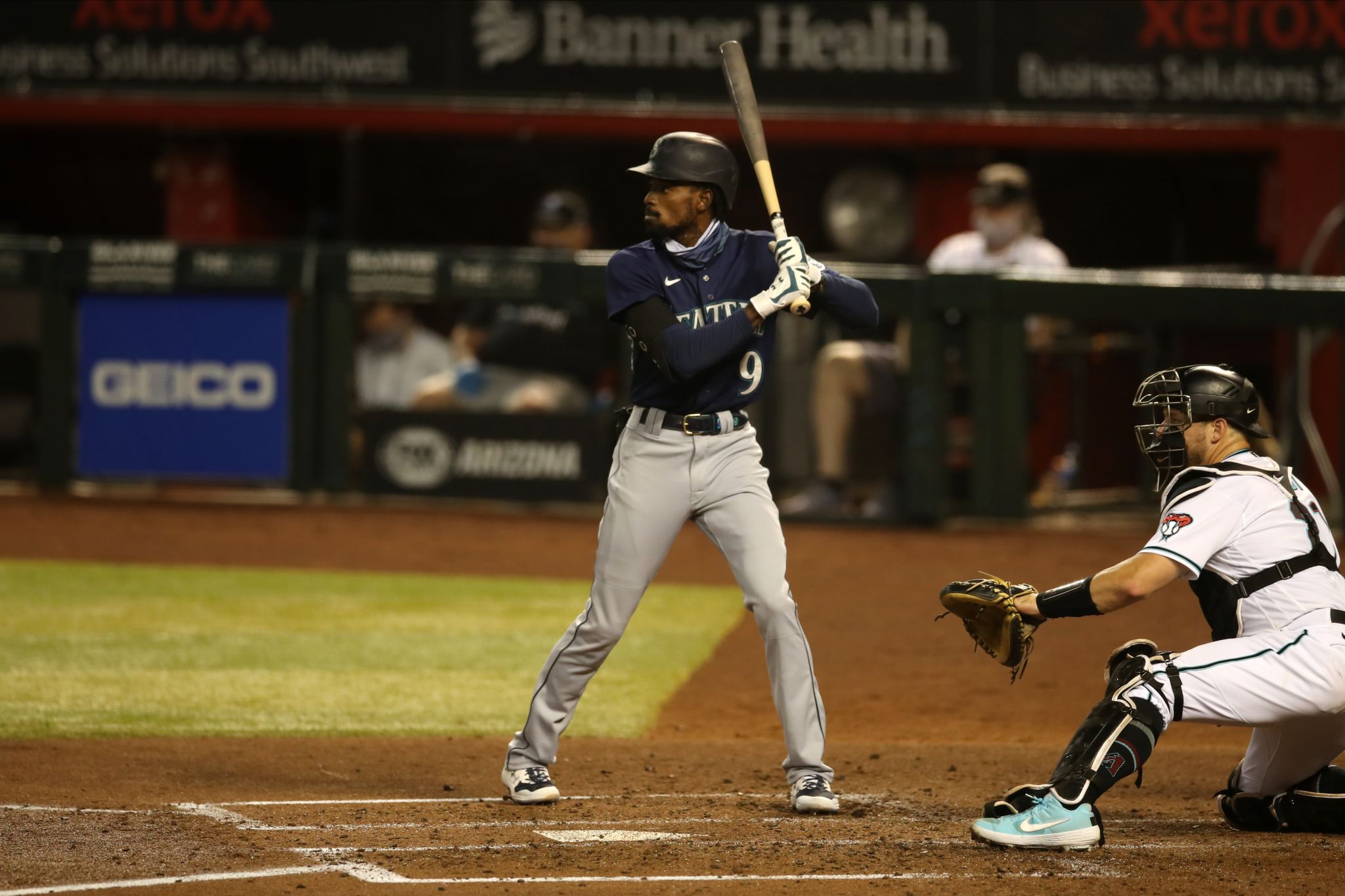 Seattle Mariners' Dee Strange-Gordon adjusts his batting helmet