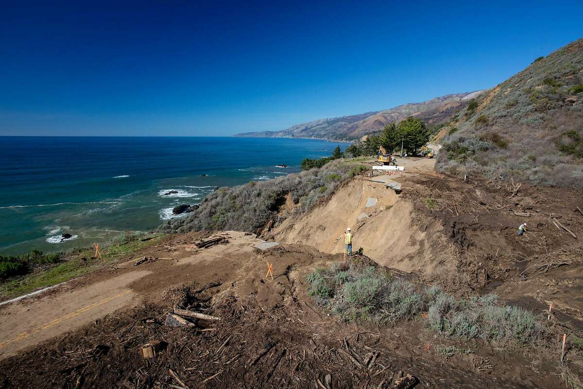 A Caltrans crew works at the site of a washout on Highway 1 near Rat Creek in February.