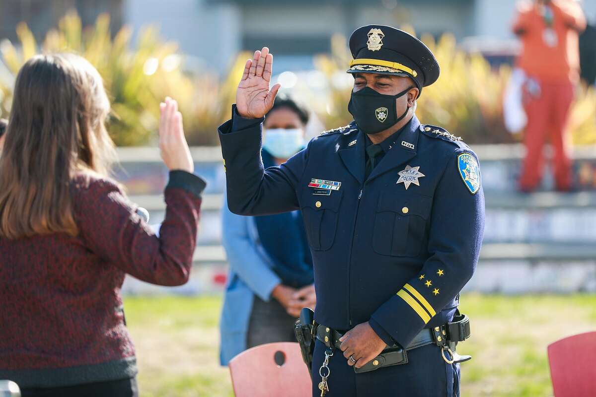 Oakland Mayor Libby Schaaf swears in new Oakland Police Chief LeRonne Armstrong at McClymonds High School on Monday, Feb. 8, 2021 in Oakland, California.