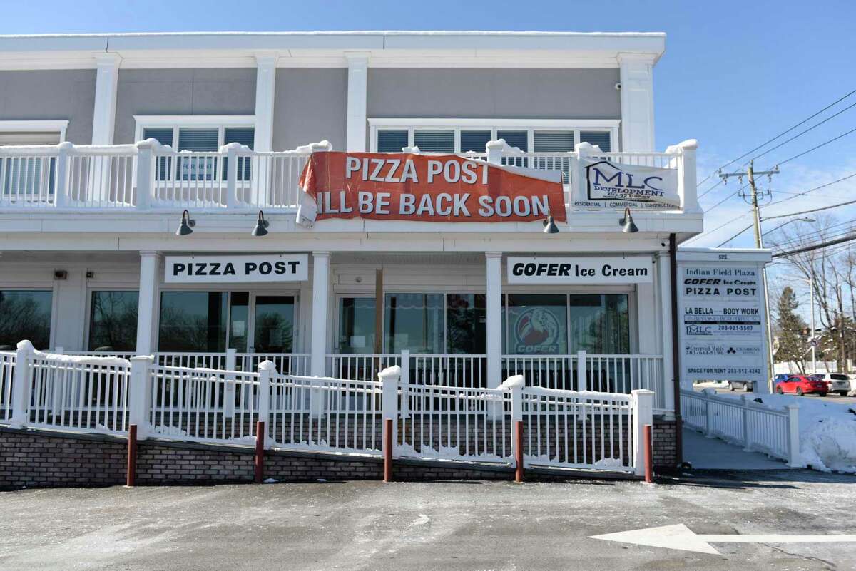 Pizza Post readies for re-opening in the Cos Cob section of Greenwich, Conn. Monday, Feb. 8, 2021. Owner Matthew Criscuolo has been working to renovate and expand the space since a fire destroyed it in 2019 and hopes to reopen this month.