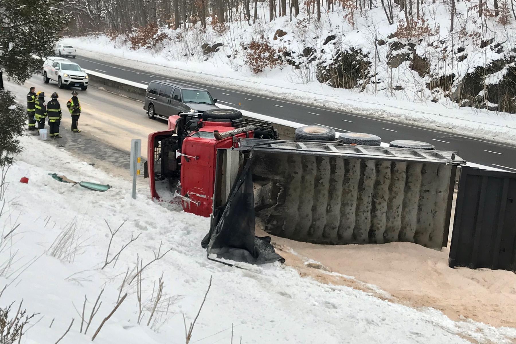FD units: Truck rollover dumps 22 tons of salt on Route 8 in Ansonia