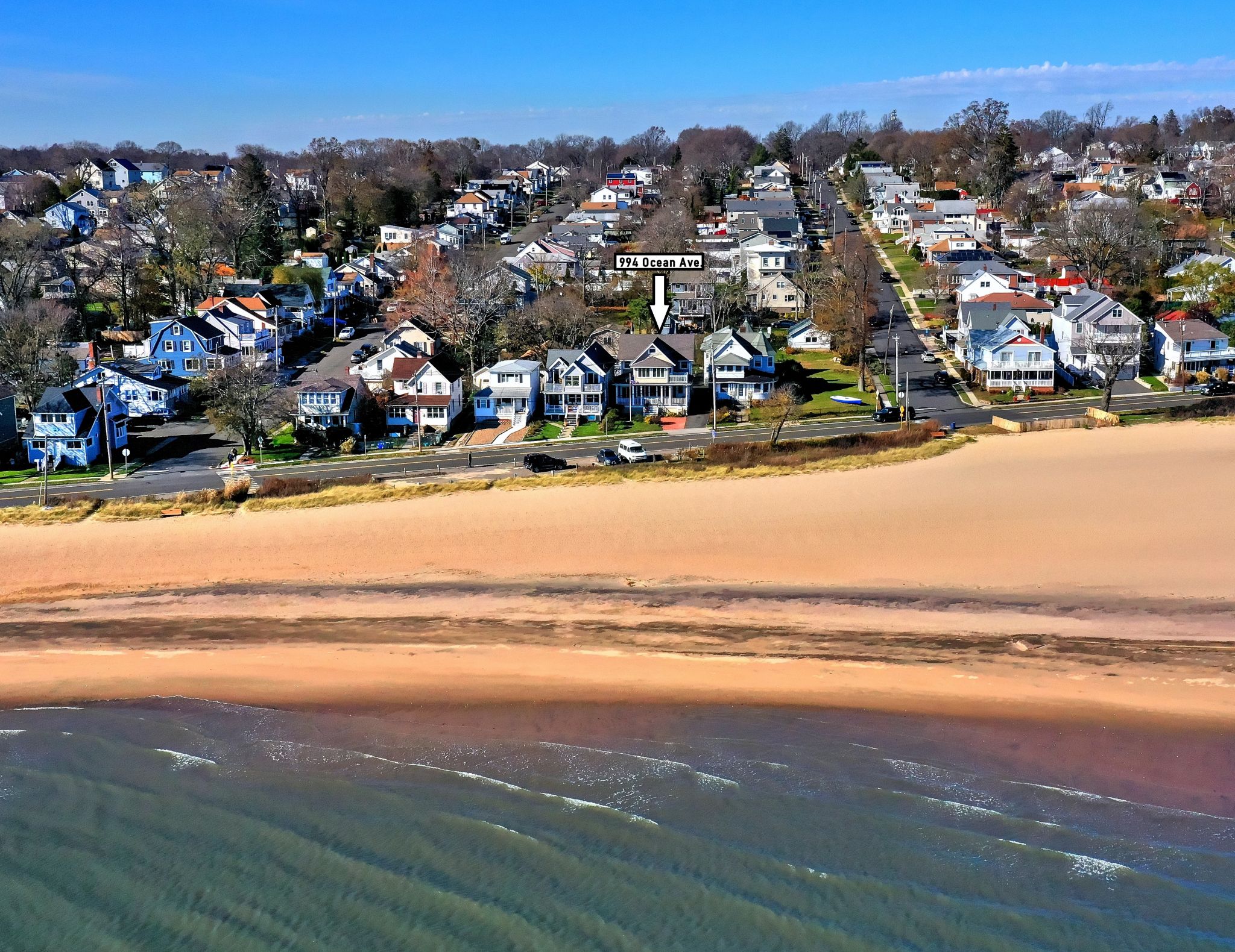 On the market West Haven beach house and private parking lot