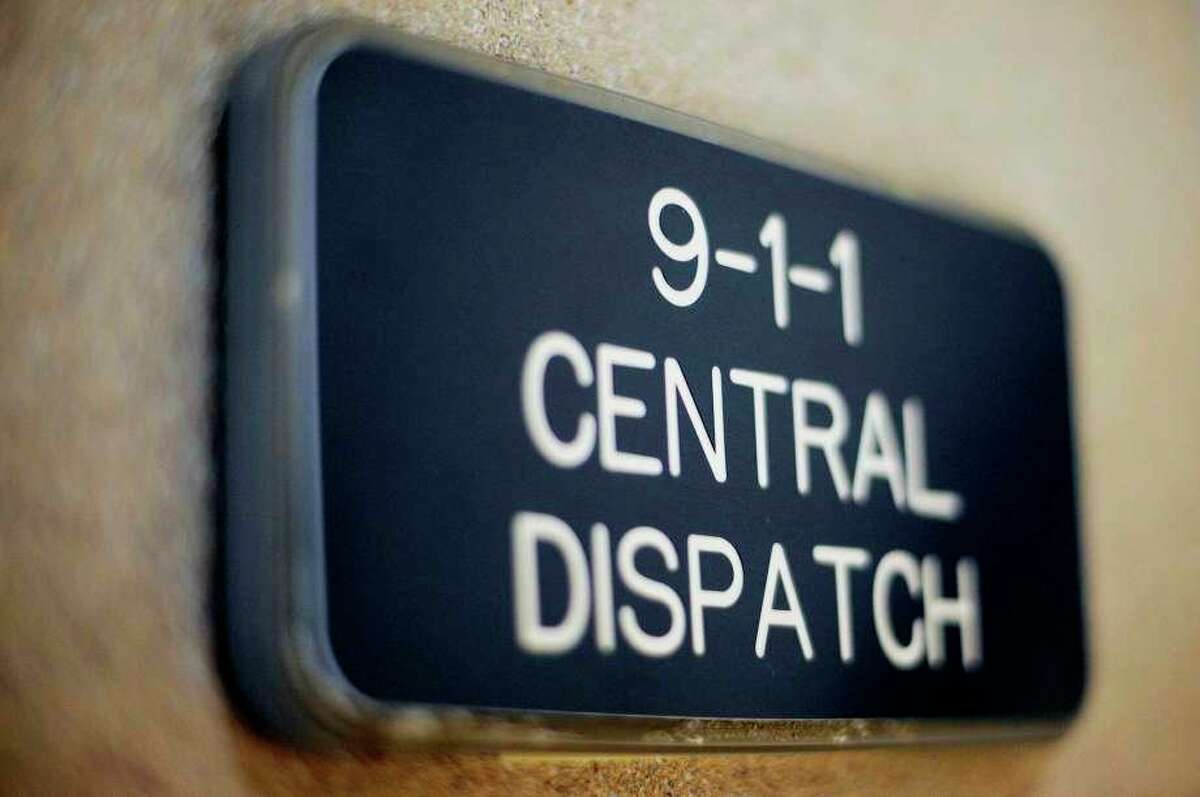 FILE -- A sign at the entrance to the Midland Central Dispatch Authority office in the Law Enforcement Center. (Nick King/Midland Daily News file)