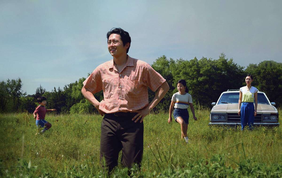 Alan S. Kim, left, Steven Yeun, Noel Cho and Yeri Han in A24's "Minari." (David Bornfriend/A24/TNS)