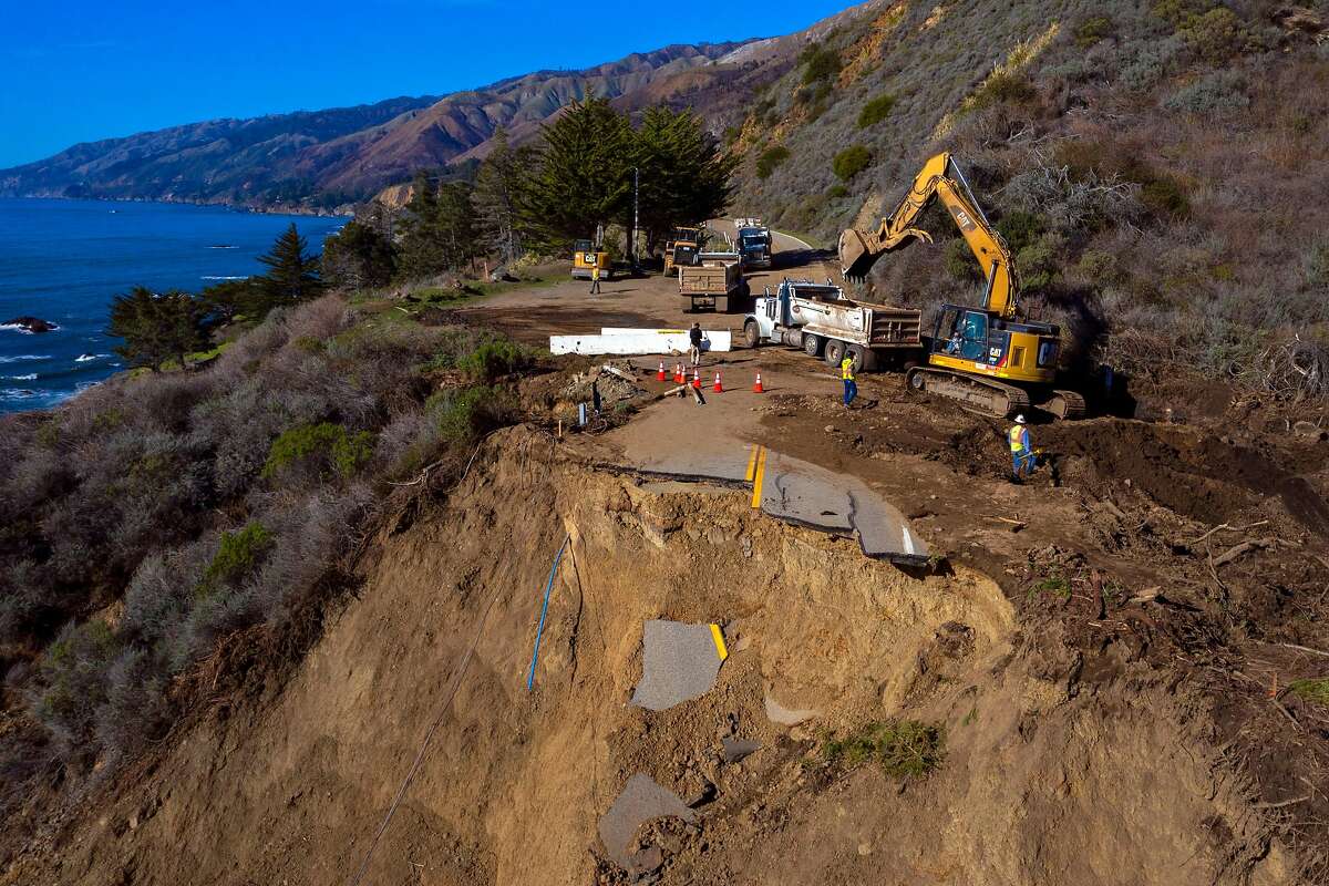 Caltrans and construction crews work on the collapsed Highway 1 near Rat Creek in Big Sur on Thursday.