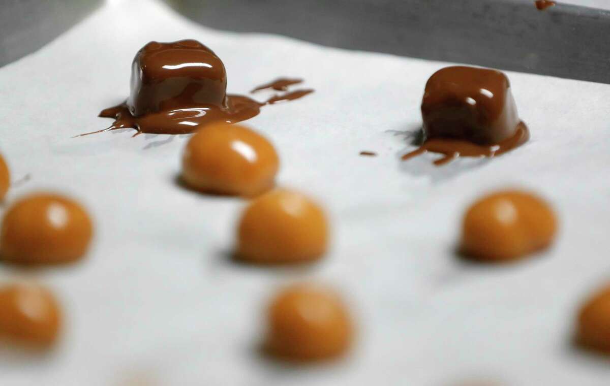 Chocolate-covered caramels are seen at Chocolate Passion, Tuesday, Feb. 9, 2021, in Conroe.