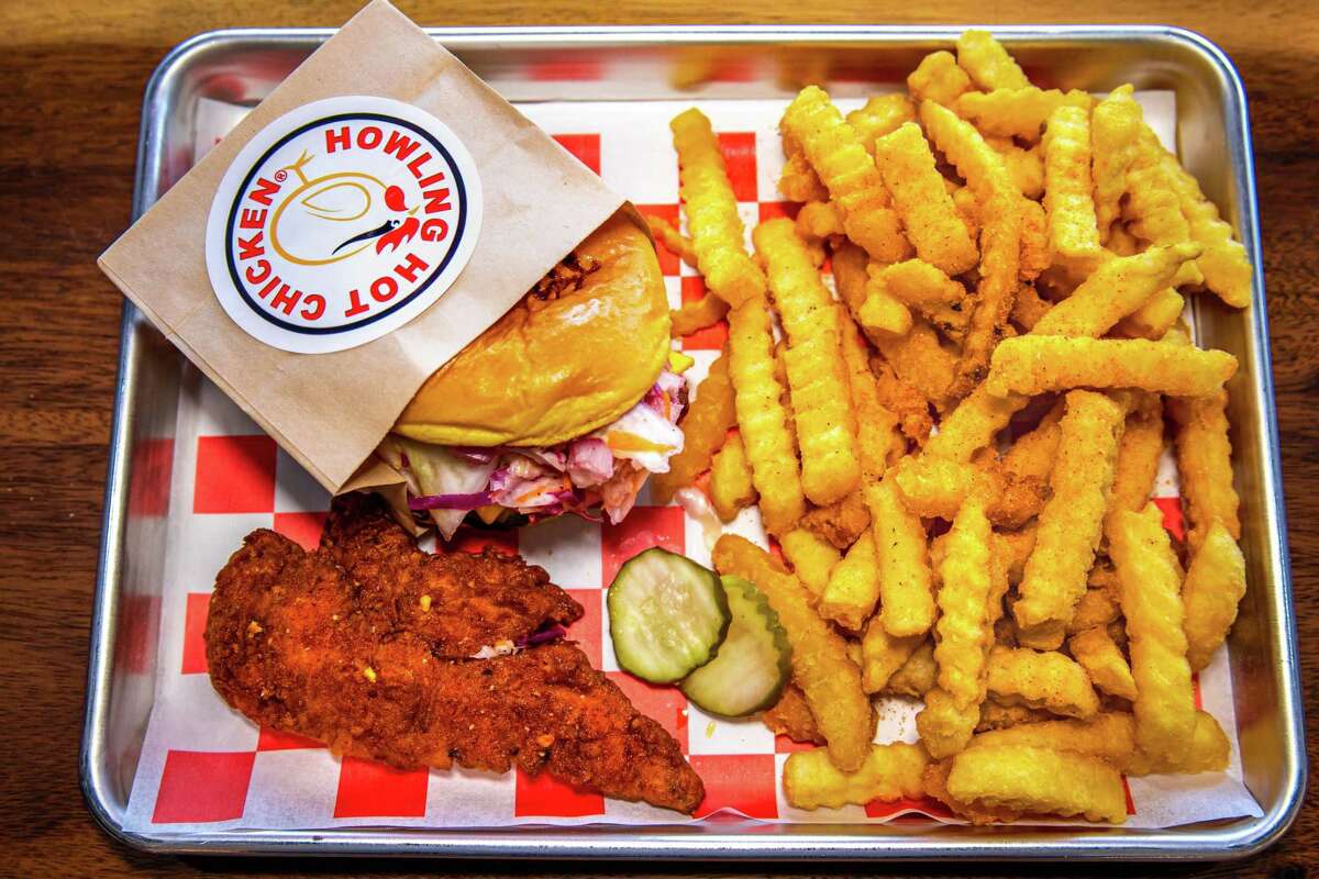A combination meal from Howling Hot Chicken in Bridgeport, with tender, slider and fries.