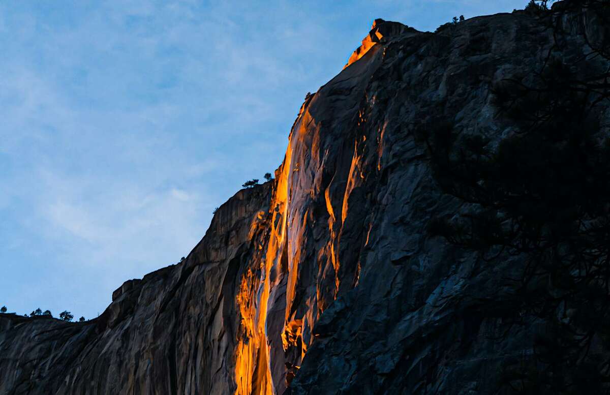 The glowing Horsetail Falls during a