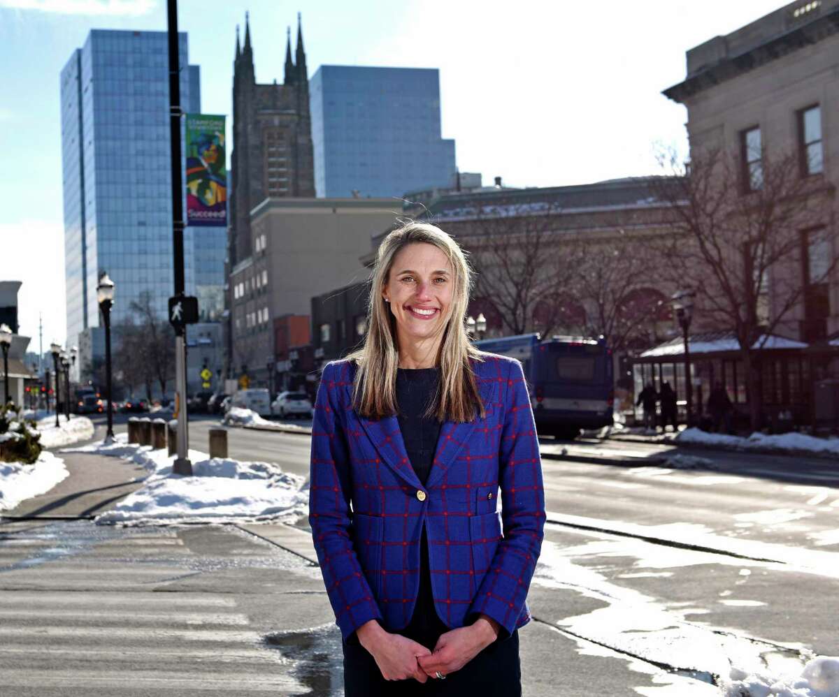 State Rep. Caroline Simmons, D-Stamford, poses in downtown Stamford, Conn. Wednesday, Feb. 10, 2021. Simmons was endorsed by the Democratic City Committee for mayor but incumbent Mayor David Martin has forced a primary election.