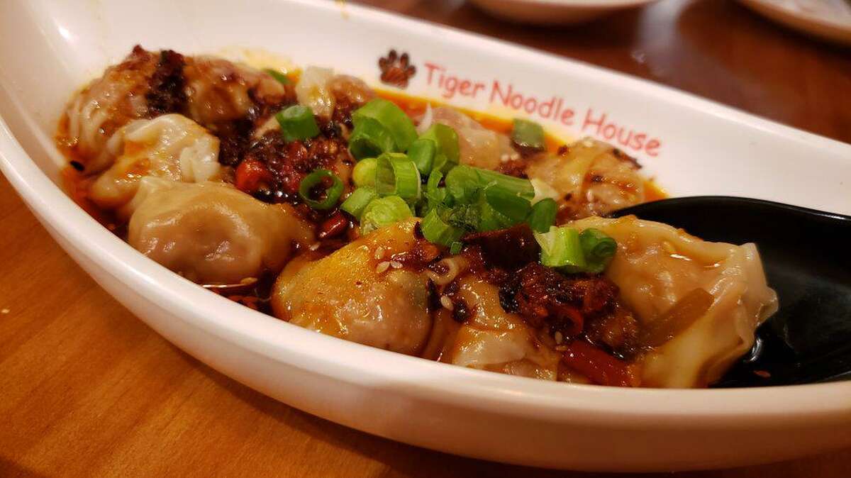 Katy Taste Crawl gives Katy-area food lovers opportunities to try appetizers at 15 local restaurants while supporting charities. The event runs through Wednesday, March 31. Spicy pork wontons from Tiger Noodle House are pictured here.