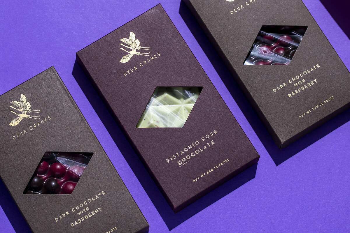 Pistachio rose chocolate and dark chocolate with raspberry by Deux Cranes photographed in San Francisco, Calif. on Monday, Feb. 8, 2021.