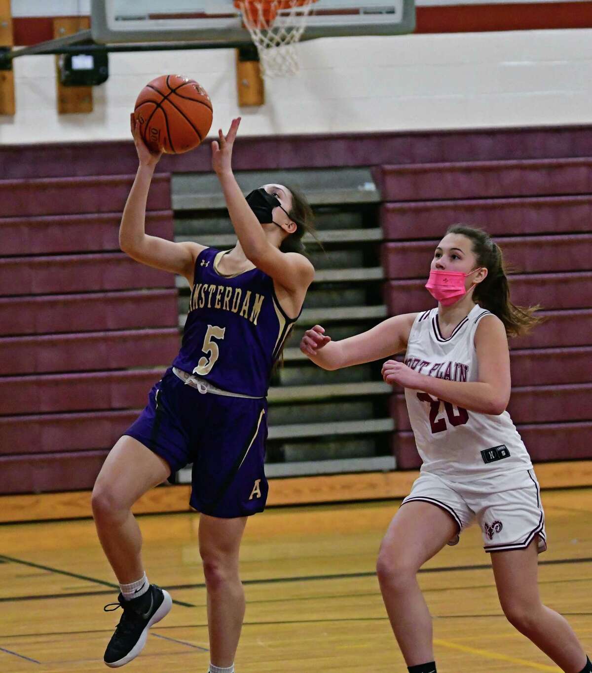 Amsterdam's Anne Stanavich goes up for a layup during a basketball game against Fort Plain on Wednesday, Feb. 10, 2021 in Fort Plain, N.Y. (Lori Van Buren/Times Union)