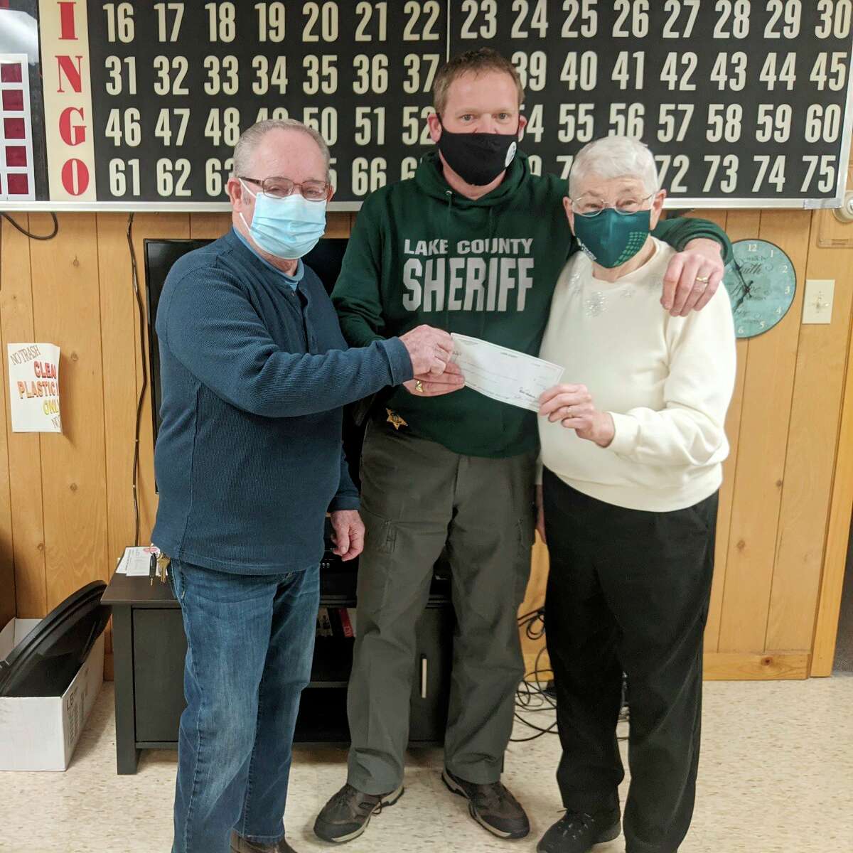The Lake County Sheriff's Office Returnable Charity Campaign continues to have success and help many in the area. Lake County Sheriff Rich Martin recently presented a $1,000 donation to the Peacock Senior Center as a result of all the cans and bottles recently collected and returned. The sheriff said it's an ongoing program that will continue to benefit several charities within Lake County. (Photo Courtesy of the Lake County Sheriff's Office)