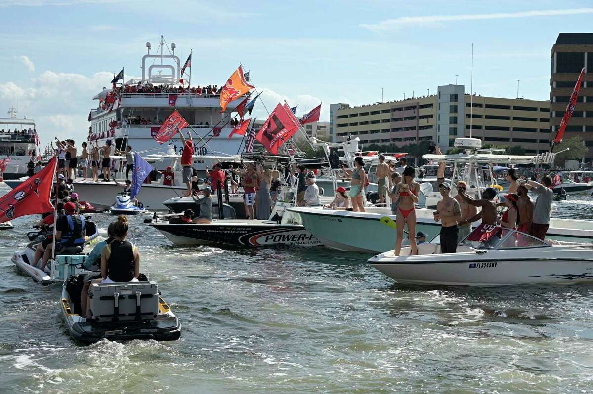 Buccaneers fans crowd the waterway on Wednesday.