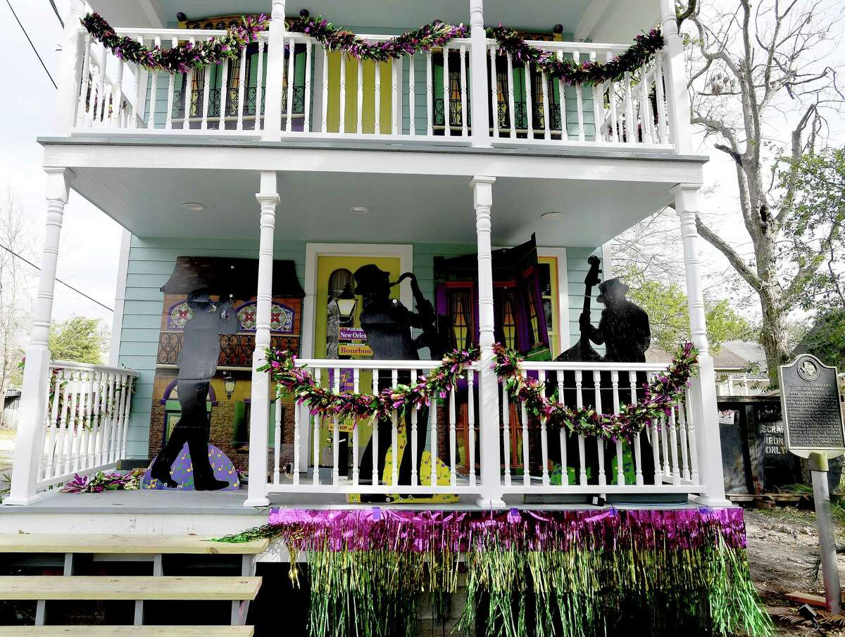 Homes in the Orange historic district are decorated in Mardi Gras themes for the city's Yardi Gras in lieu of the traditional celebrations that have been cancelled due to COVID-19 this year. Photo taken Thursday, February 4, 2021 Kim Brent/The Enterprise