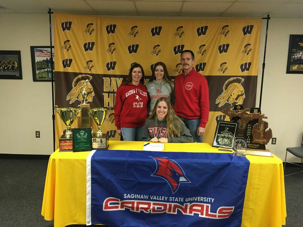 Karissa Picard is pictured with her family on signing day.