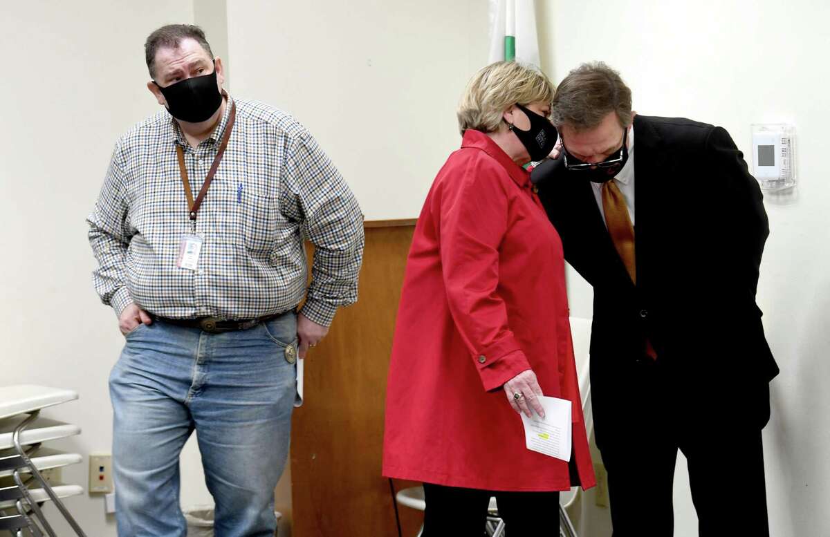 Mayor Becky Ames confers with Jefferson County Judge Jeff Branick during a joint press conference Monday to discuss the team effort being used to prepare for and obtain COVID-19 vaccine. Photo taken Monday, January 25, 2021 Kim Brent/The Enterprise