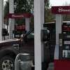 Customers purchase gasoline from the Stewart's Shops store at Albany Saker and Everett roads on Monday, Feb. 8, 2021, in Colonie, N.Y. Gas prices are spiking thanks to production cutbacks and early signs of economic recovery. (Will Waldron/Times Union)